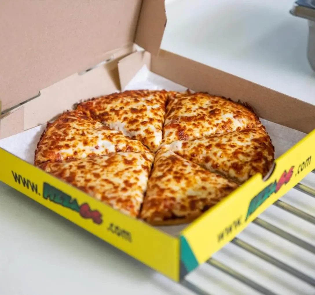 Fresh handmade pizzas with specialty toppings at Pizza 64 Kitchen + Bar Winnipeg