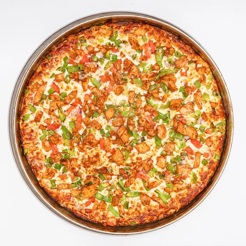 Pizza 64 tandoori chicken pizza Winnipeg Indian fusion specialty